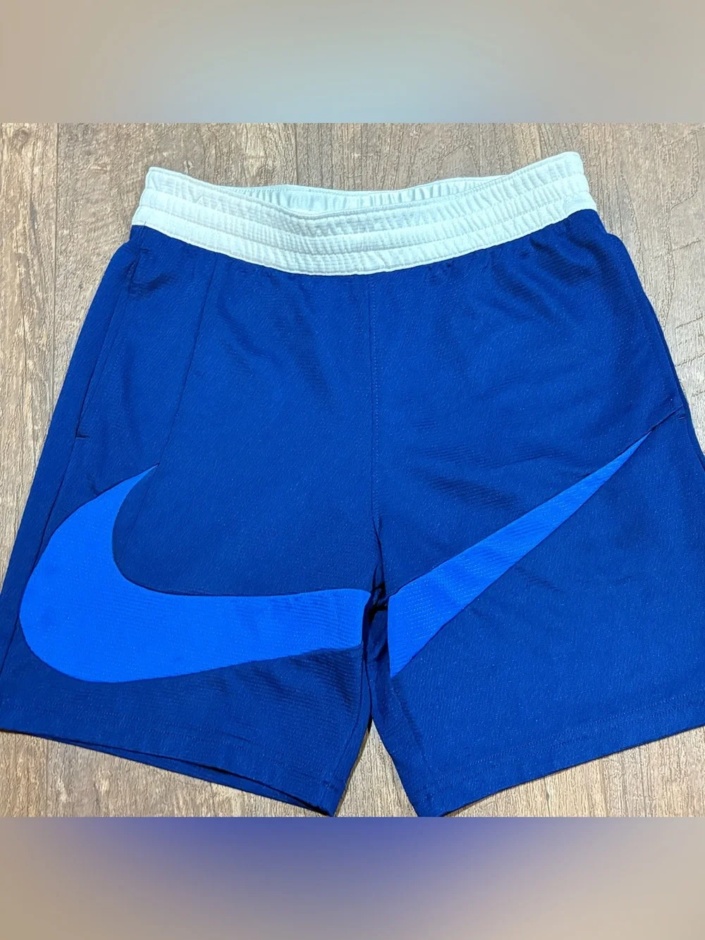 Nike Royal Blue Kids Athletic Shorts with Light Blue Swoosh and White Waistband